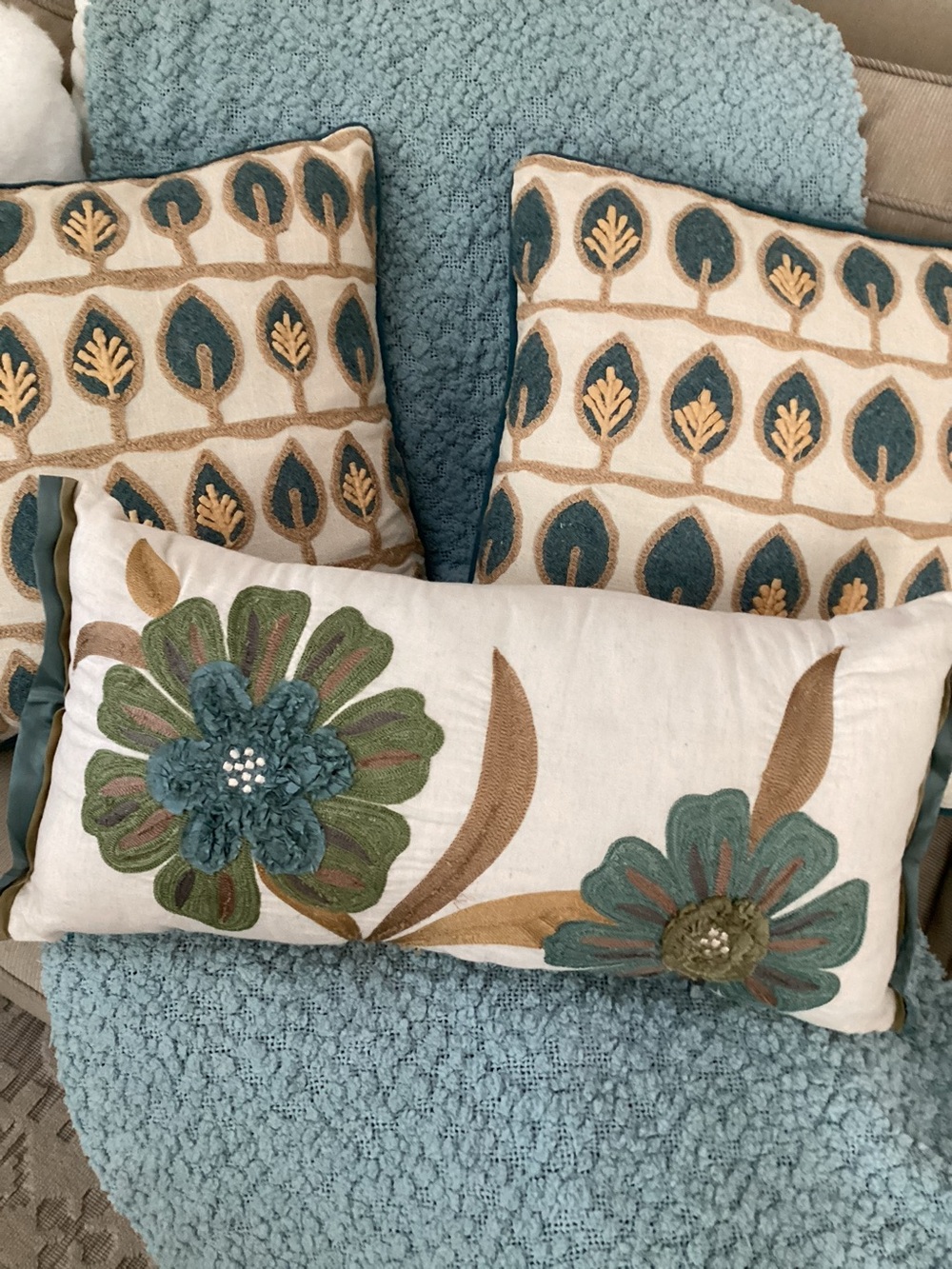 Pier 1 Pillows in Teal and Green (3),and a light teal throw in brand Storehouse.